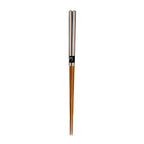 Pair of wooden chopsticks with silver accents on a white background