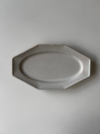 Octagonal ceramic plate on a plain background