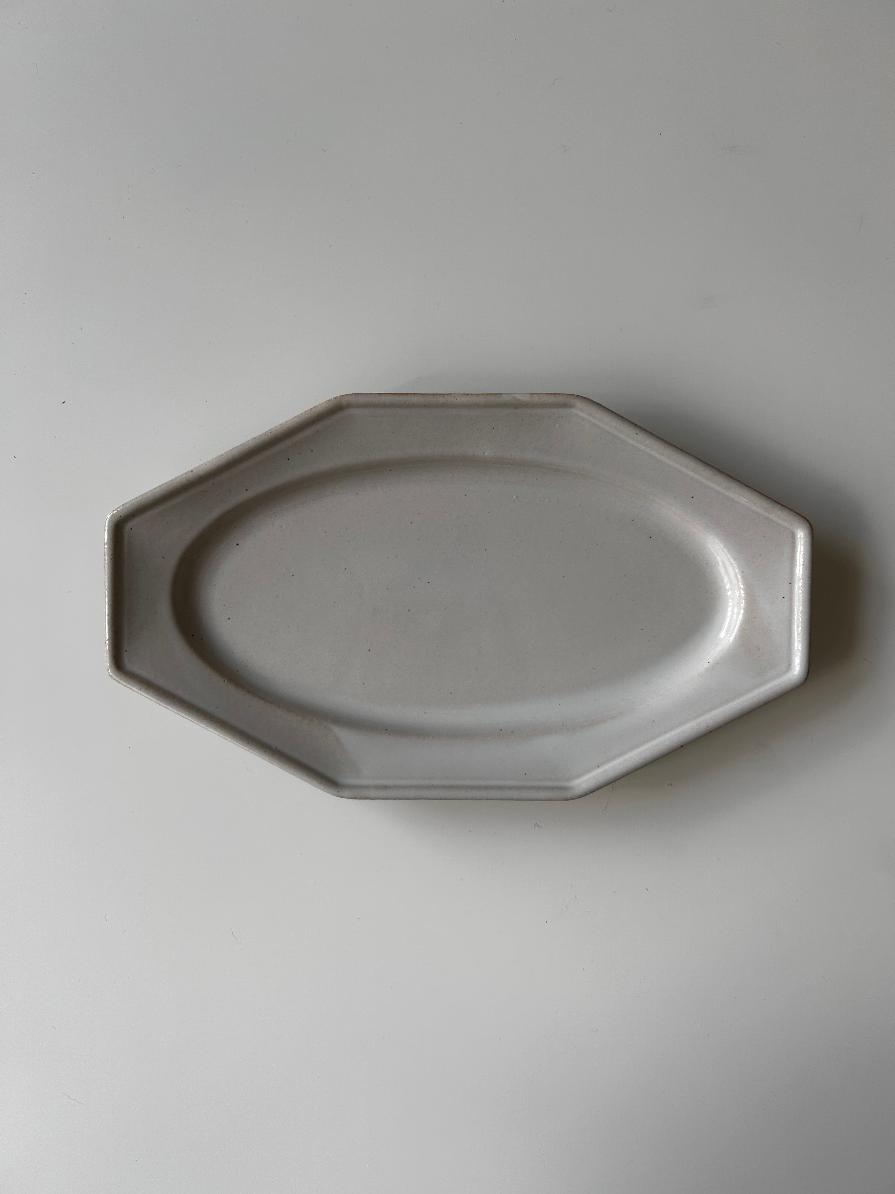 Octagonal ceramic plate on a plain background